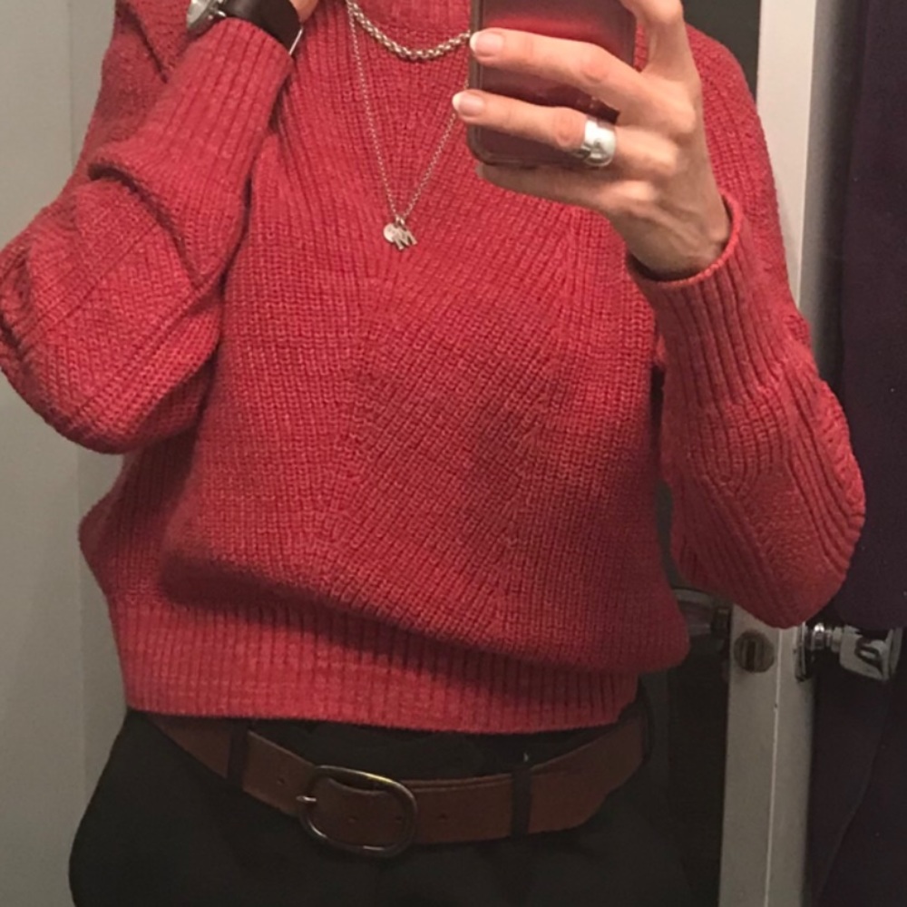 Salmon coloured thick cotton sweater.